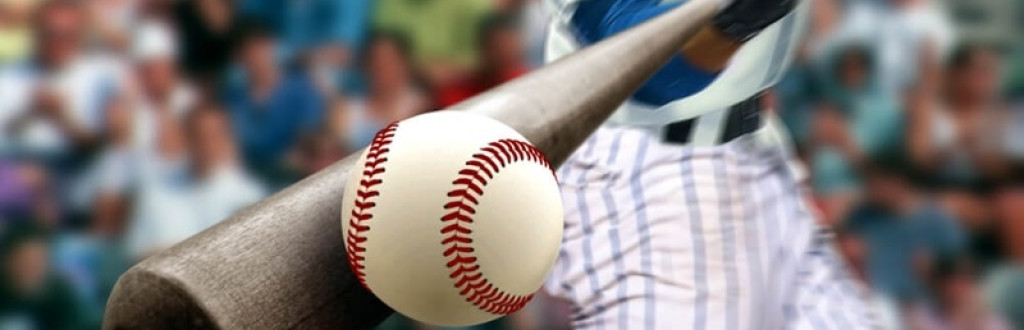 Baseball player hitting ball