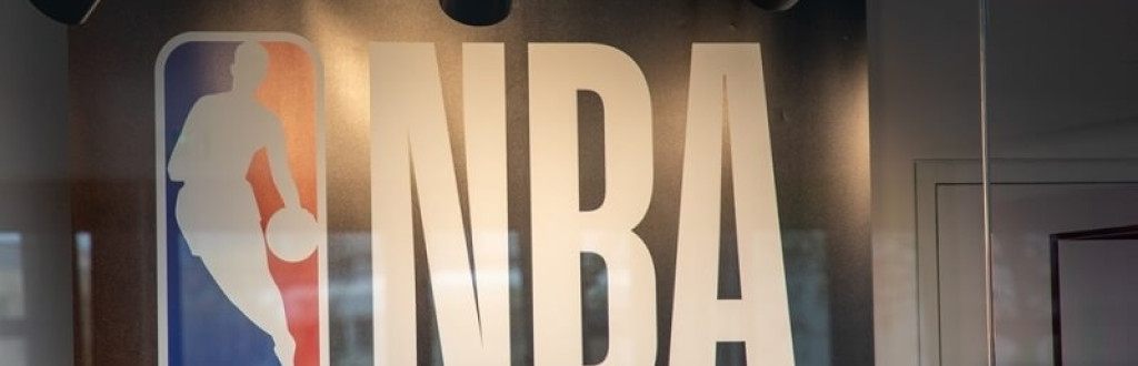 NBA logo poster highlighted by some focus lights