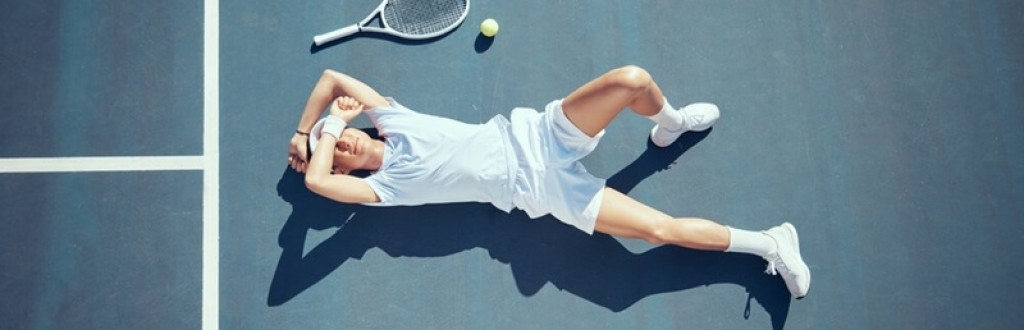  Relax tennis player lying on ground