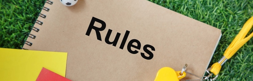 Football soccer rules book and referee equipment; soccer whistle and cards 