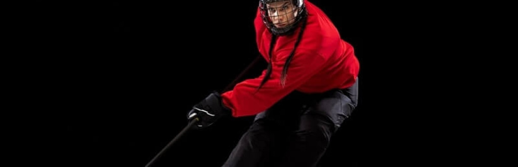 Stickhandling. Professional female hockey player training