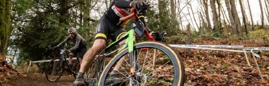 male bike racer competes in a cyclocross bike race