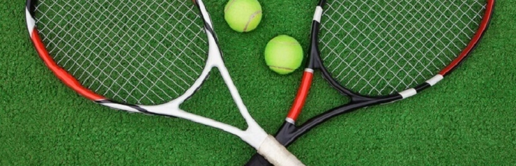 tennis racket with tennis balls on ground